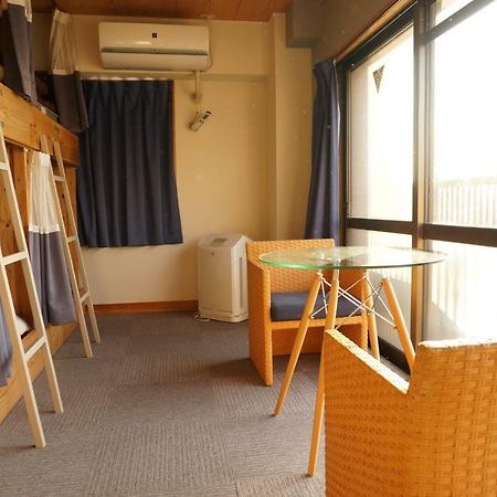 Guesthouse Arigato Hiroshima Esterno foto