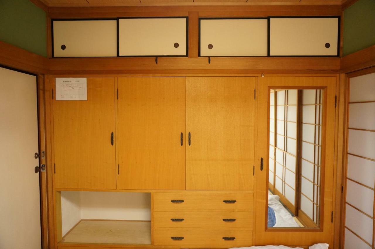 Guesthouse Arigato Hiroshima Esterno foto
